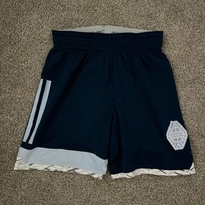 Adidas Uprising Basketball Shorts for sale in a size large.